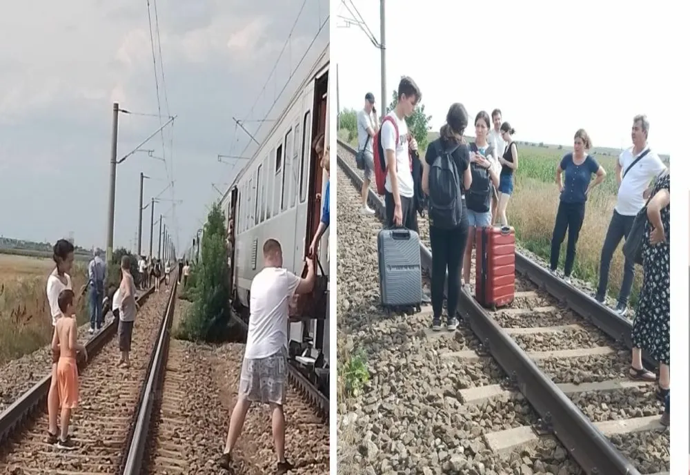Un tren a rămas blocat pe câmp, după ce s-a stricat locomotiva. Pasagerii au ieșit la ocazie