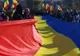 FOTO: Tricolor de 18 metri, purtat pe străzile din Lupeni