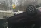 Două persoane încarcerate într-un autoturism răsturnat