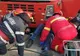 FOTO| Bărbat rămas captiv sub un autotren, salvat de pompieri
