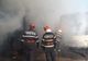 FOTO| Incendiu puternic la un atelier auto din Cristur. Un autocar a fost cuprins de flăcări
