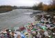 Sute de kilograme de gunoaie adunate de pe malul Crișului Alb