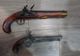 Polițiștii hunedoreni au descoperit mai mule pistoale de colecție în locuința unui bărbat